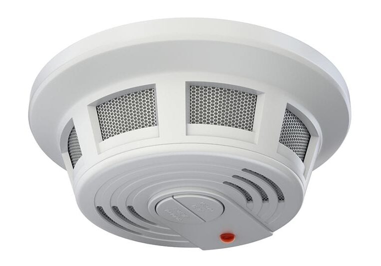 A carbon monoxide alarm. Learn the Facts About Carbon Monoxide.|A focused image of a carbon monoxide alarm. Learn the Facts About Carbon Monoxide.
