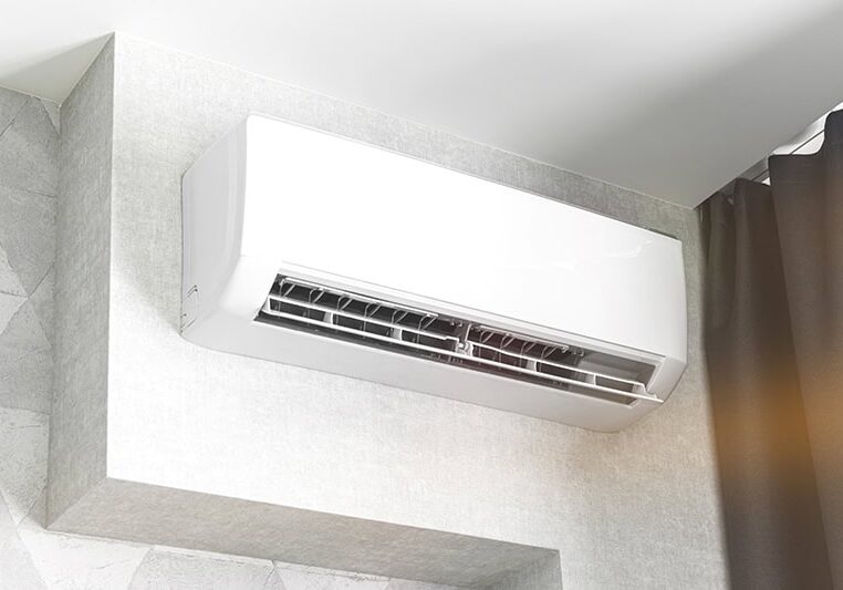 Air conditioner system on white wall living room interior, modern design concept background